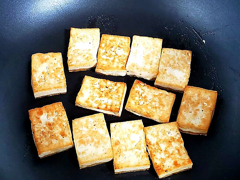 Sear firm tofu