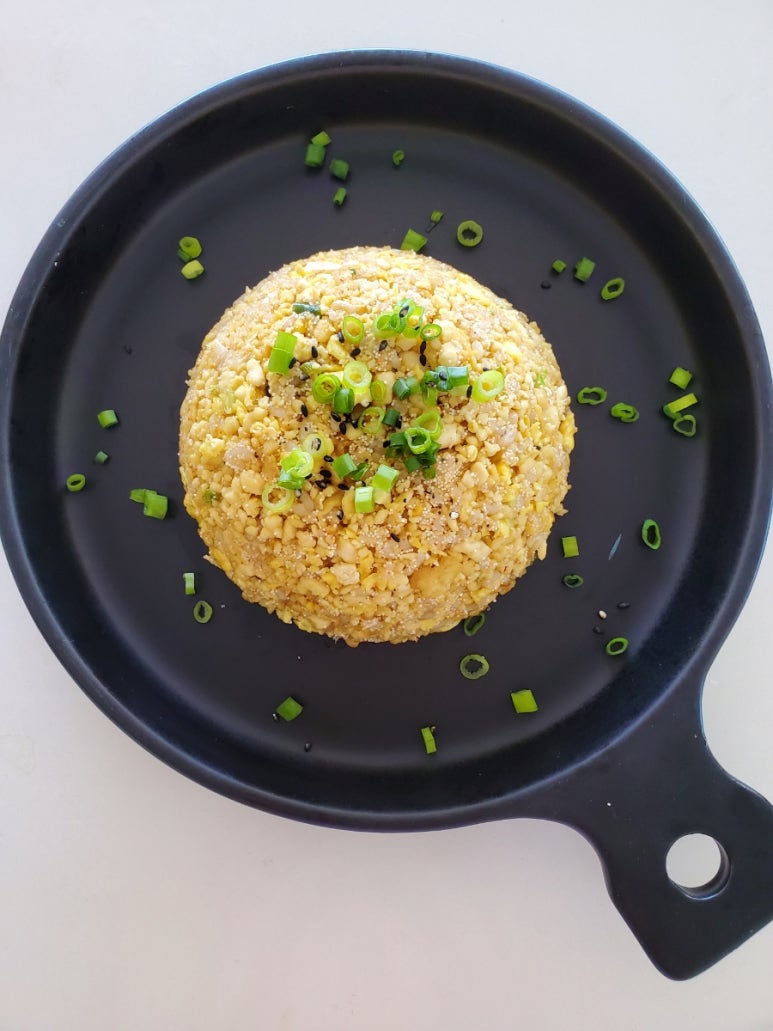 Mashing and squeezing tofu