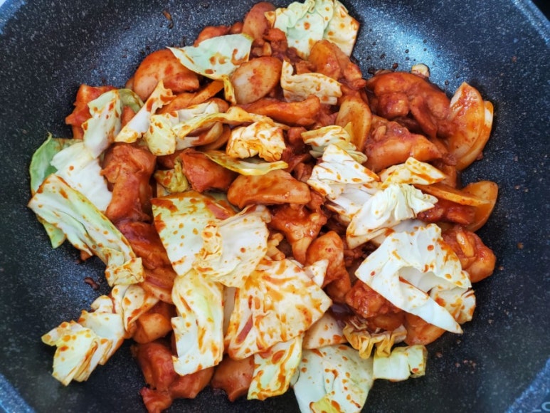 Adding cabbage