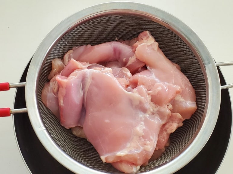 Washing chicken